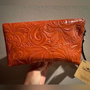 Patricia Nash, orange leather tooled clutch/wristlet
